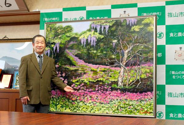 火置 弘さんと、洋画「夢幻（むげん）」の写真