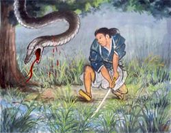 蛇を刀で切る男が描かれた絵